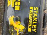 a small box with a yellow and black sign on it