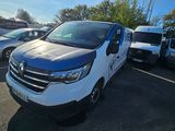 a white van that is parked in a parking lot