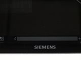 a close up picture of a black camera with a white background