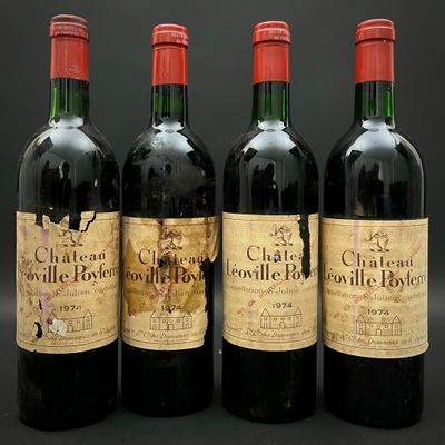 trois bouteilles de vin rouge sont alignées sur une table