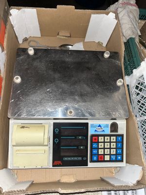 a box with a digital scale in it on a table