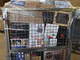 a metal cart with many items in it in a warehouse