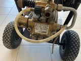 a machine that is sitting on the floor in the room