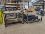 a workbench in a warehouse with a lot of boxes on it