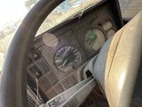 dashboard of a truck with a steering wheel and gauges