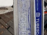 a close up of a bike tire with a sticker on it