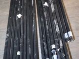 a lot of pipes that are sitting on the floor