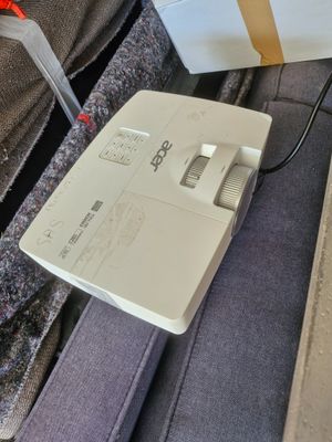 a remote control sitting on top of a bed