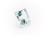 a square cut aquamarinee diamond on a white background