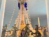 a chandelier that has a lot of candles in it