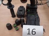 a picture of a corded drill and other tools on a table