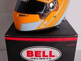 helmet on top of a box with a sticker on it