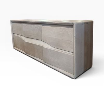 a close up of a wooden dresser on a white background