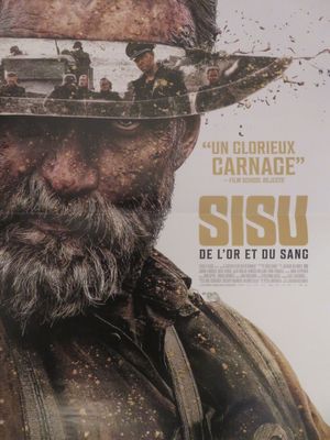 affiche représentant un homme barbu portant un chapeau de cow-boy