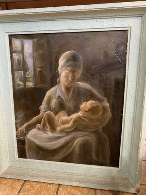 une peinture à l'huile représentant une femme tenant un bébé dans ses bras
