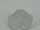 an image of a clear glass object on a white surface
