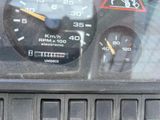 a close up of a car dashboard with a speedometer