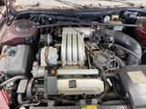 a picture of a car engine with its hood open