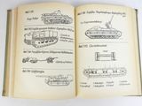an open book with drawings of military vehicles on it