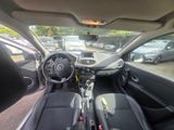 a picture of the interior of a car in a parking lot