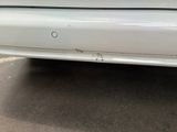 a close up of a car with a lot of scratches on it