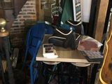 a bag sitting on a table in the corner of a room