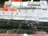 an image of a man working on a piece of metal