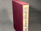 a picture of a red book on a gray surface