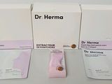 three packets of dr herma sit on a table next to each other
