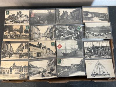 several old black and white photos of buildings and boats in a box
