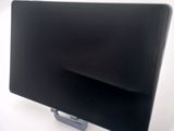 a picture of a black computer monitor on a stand