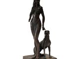 bronze statue of a woman and a dog on a marble base
