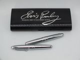 a pen and a pen case sitting on a table