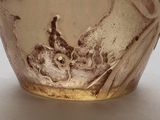 a close up of a glass with a horse on it