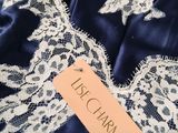 a close up of a dress with a tag on it