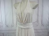 the back of a white dress on a mannequin mannequin mannequin mannequin mannequin mannequin mannequin mannequin
