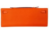 an orange long wallet on a white background