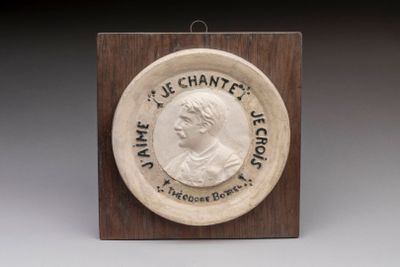 a picture of a plaque with a picture of a woman