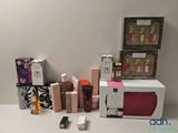 a lot of beauty products sitting on a white table