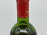 a bottle of wine that is sitting on a table