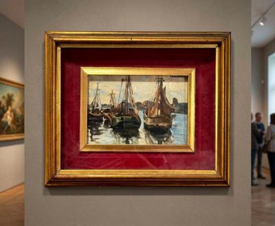 a painting on the wall of a museum with people looking at it