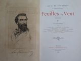 un vieux livre sur lequel figure l'image d'un homme barbu