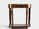a small table with a marble top on a white background