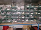 many boxes of assorted items on a shelf