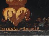 a painting on the side of a building that says original groomer