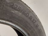the tire of a car that is sitting on the floor