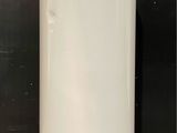 an image of a white water heater sitting on top of a counter
