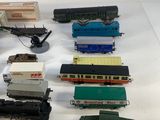 a lot of toy trains that are on a table