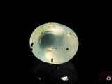 an image of a glass ball on a black surface