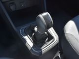 a close up of a car ' s gear lever in the center console